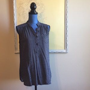 Polkadotted sleeveless blouse